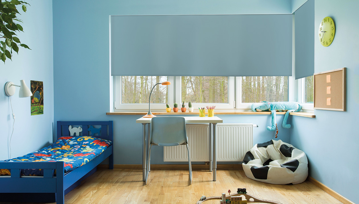 Black-out rolgordijnen in een kinderkamer